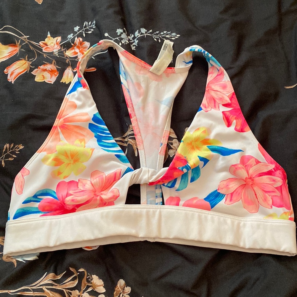 Pink Victoria’s Secret sports bra